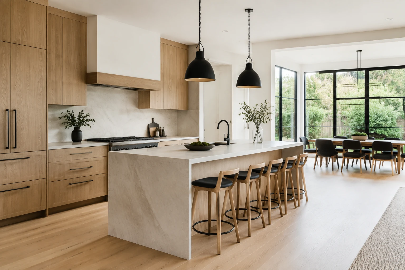 Kitchen concept with natural oak cabinetry and a stone island